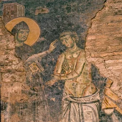 Fresco que muestra a San Benito curando al leproso